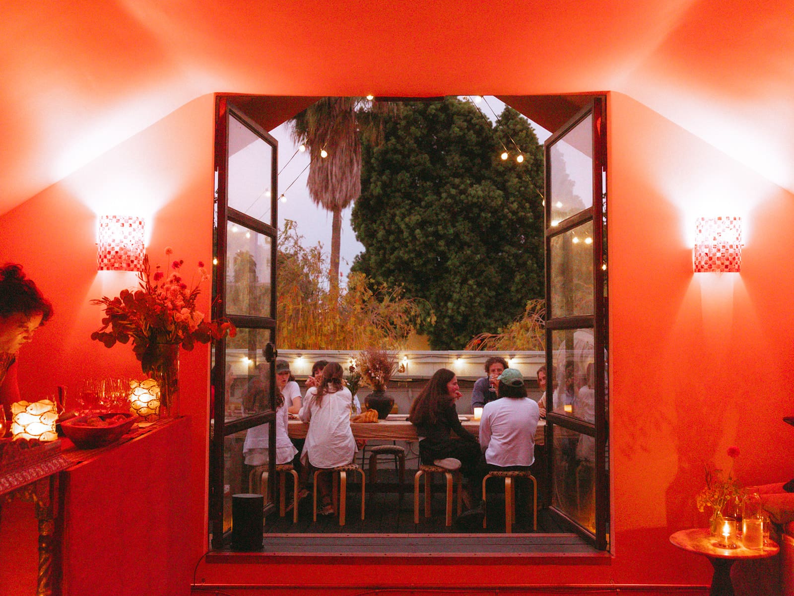 A view from the door to an outdoor table at Force of Nature in LA. Photography by Sarah Barlow