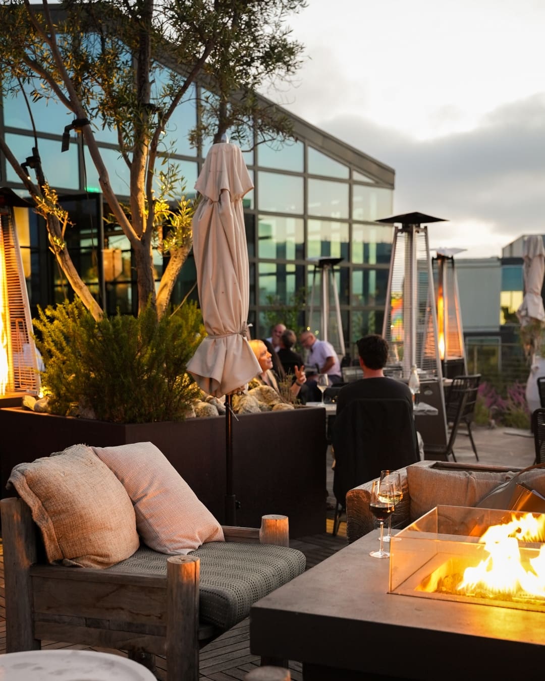 Fire pits on the rooftop at Margot, Culver City