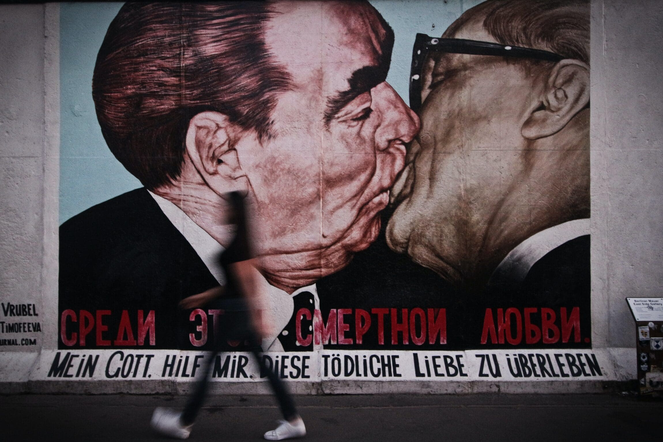 The future of queer travel | My God, Help Me to Survive This Deadly Love by Dmitri Vrubel, Berlin's most famous graffiti