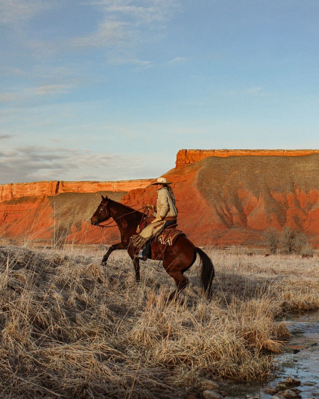 A woman on horseback at Paintrock Canyon Ranch