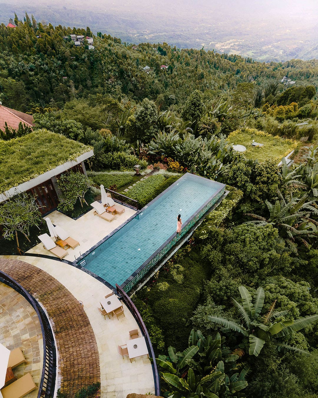 View above pool overlooking Munduk Moding Plantation, a luxury eco-resort in Bali, Indonesia