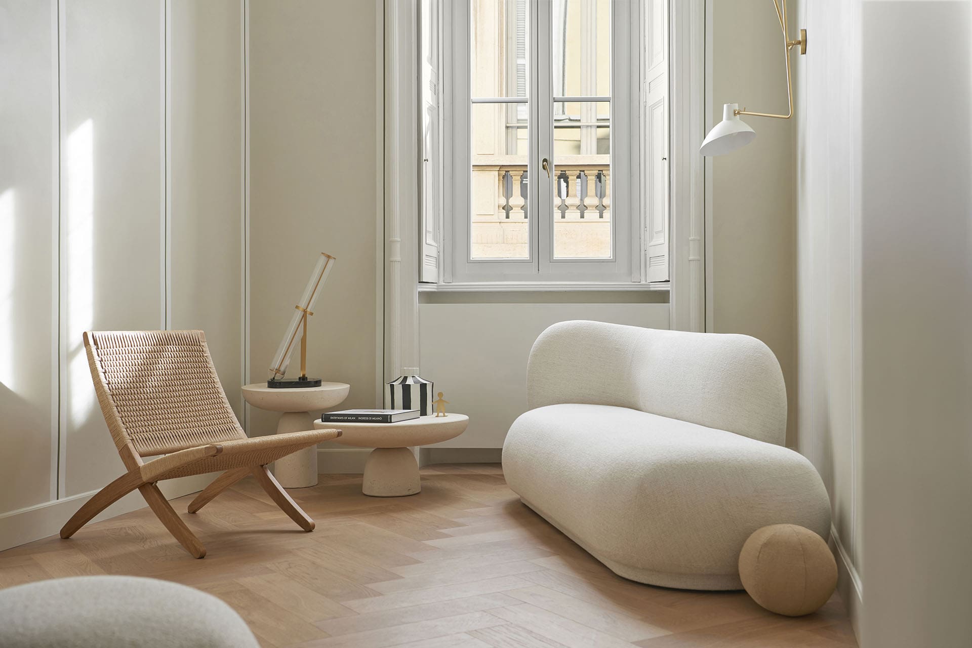 A boucle sofa and soft tones at Crossing Milano