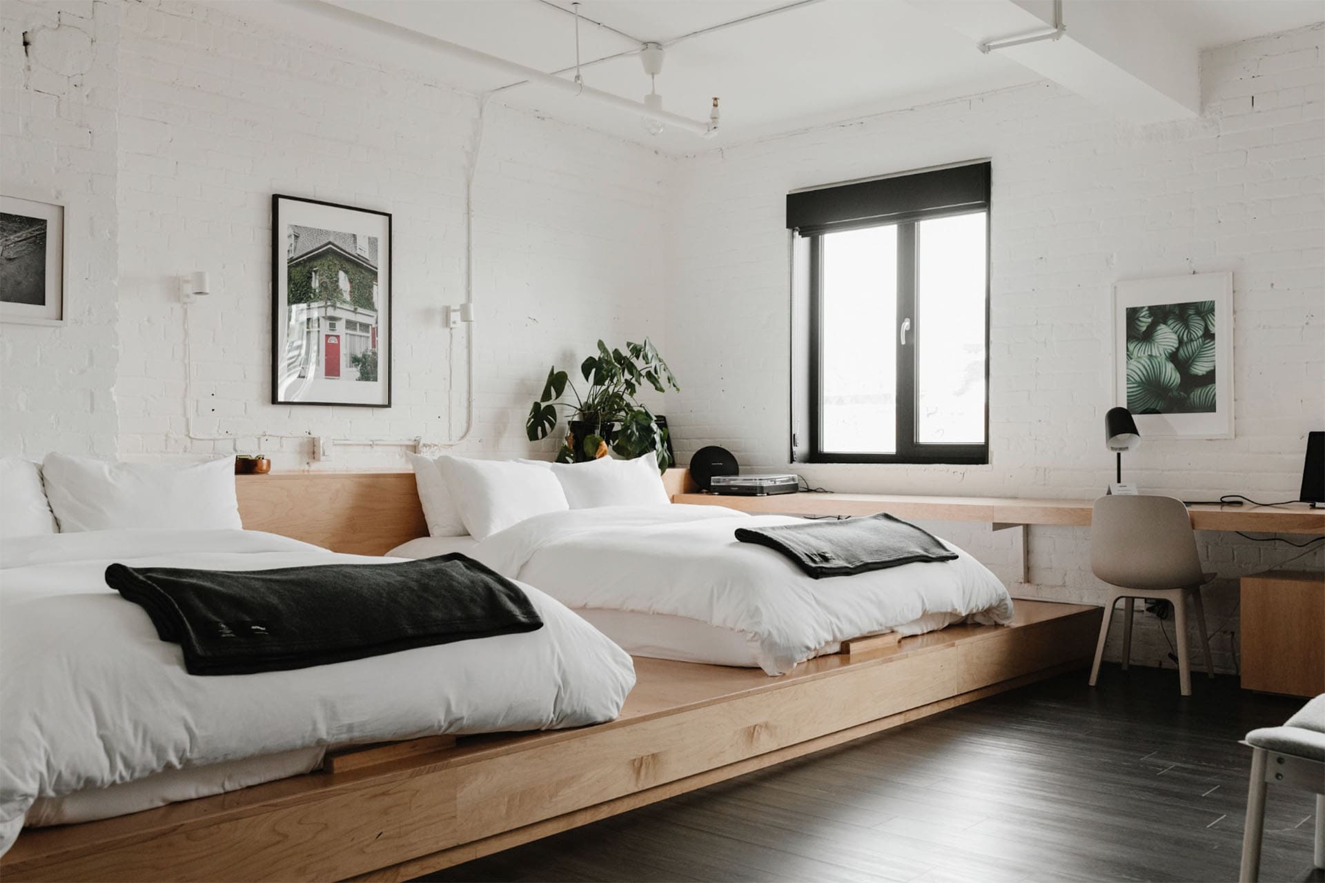 Two large beds in a modern airy hotel room