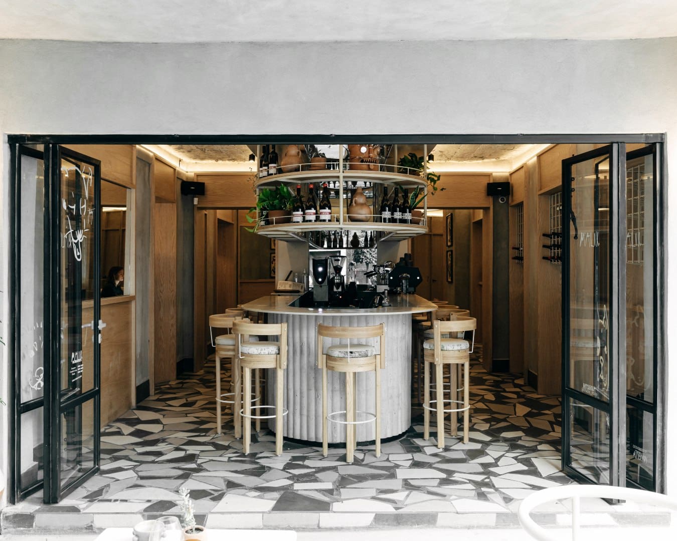 Malix in Mexico City, with a circular bar in view