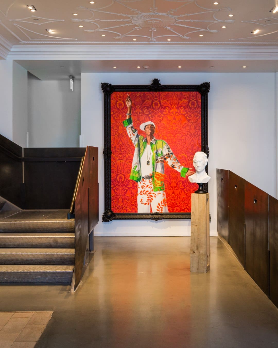 A vibrant red artwork in the lobby of 21c Lexington