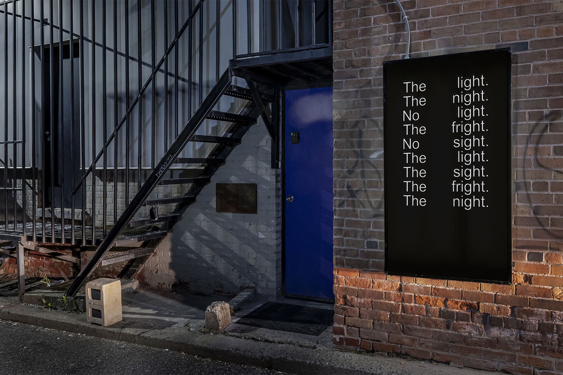 A fire escape, blue door and blackboard with writing is the exterior of The Plumb, an art space in Toronto